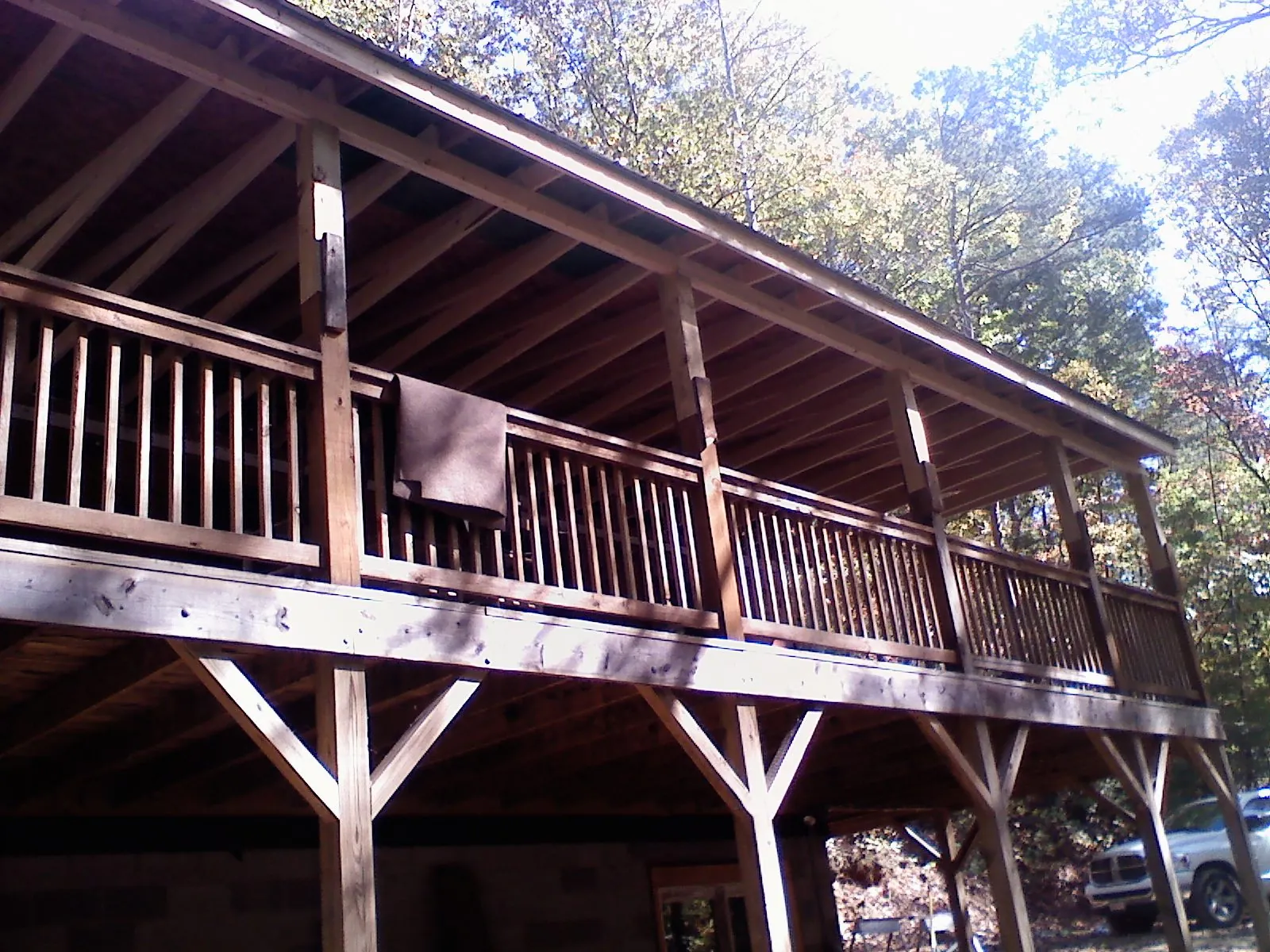 Timber framing under a new elevated porch and deck — Roof Leak Repair in Oak Island by Roofing Brothers